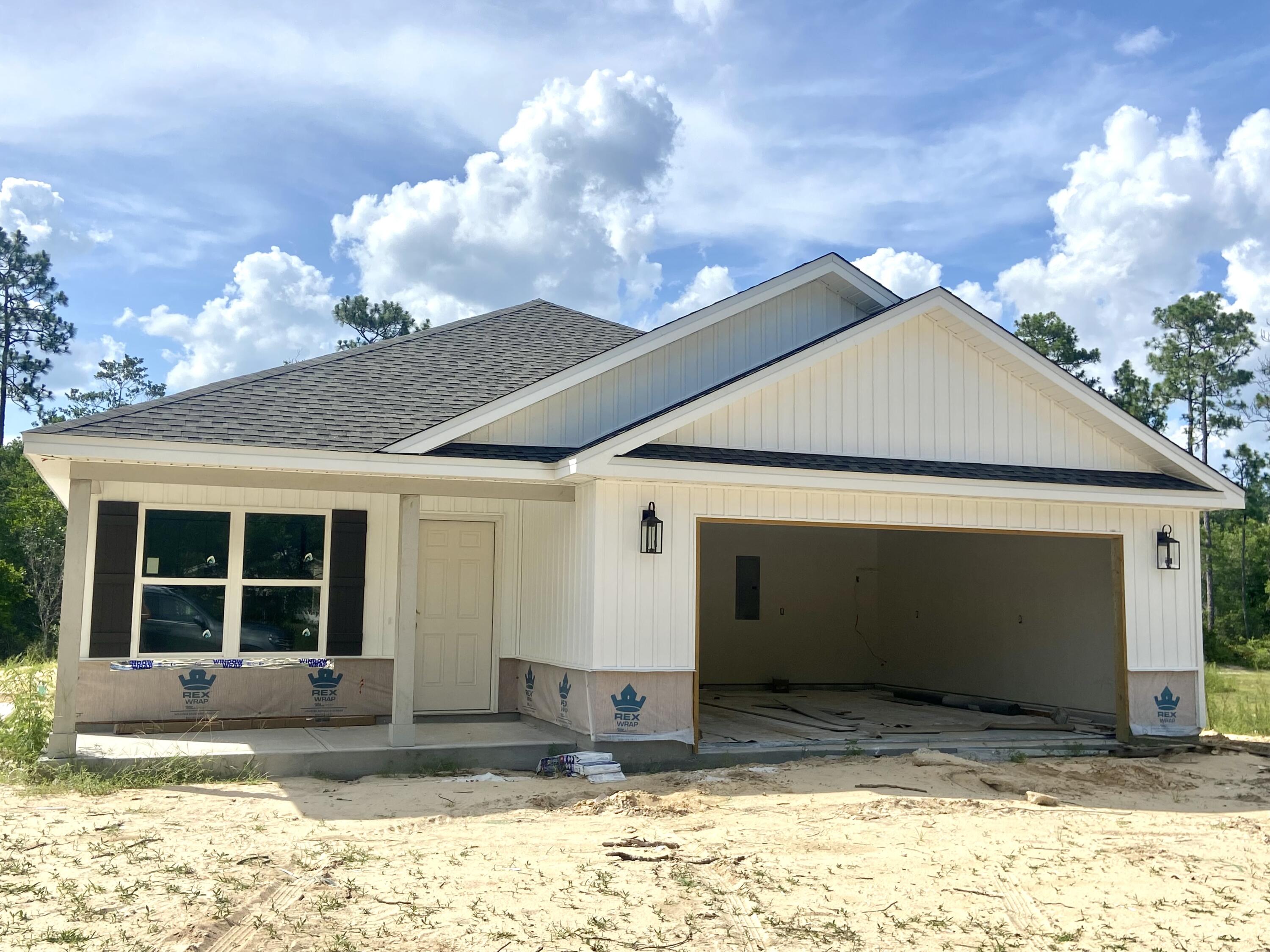 Estimated Time of Completion: August 2025 Let this beautiful craftsman house become your home! It has a brick skirting under the vinyl siding that complements the cedar shakes above the 2-car garage. The inside features an open concept with cathedral ceilings and recessed lighting in the great room while opening into the kitchen. The kitchen has pretty shaker cabinets + a beautiful island with granite countertops. There is a separate walk-in pantry, laundry room, and mud bench area. The master bedroom sits to itself with its ensuite walk-in closet & full bathroom featuring a separate tub + shower. The other 3 bedrooms are on the opposite side of the house along with another full bathroom. You can also enjoy the ourdoors from the front or back porch.