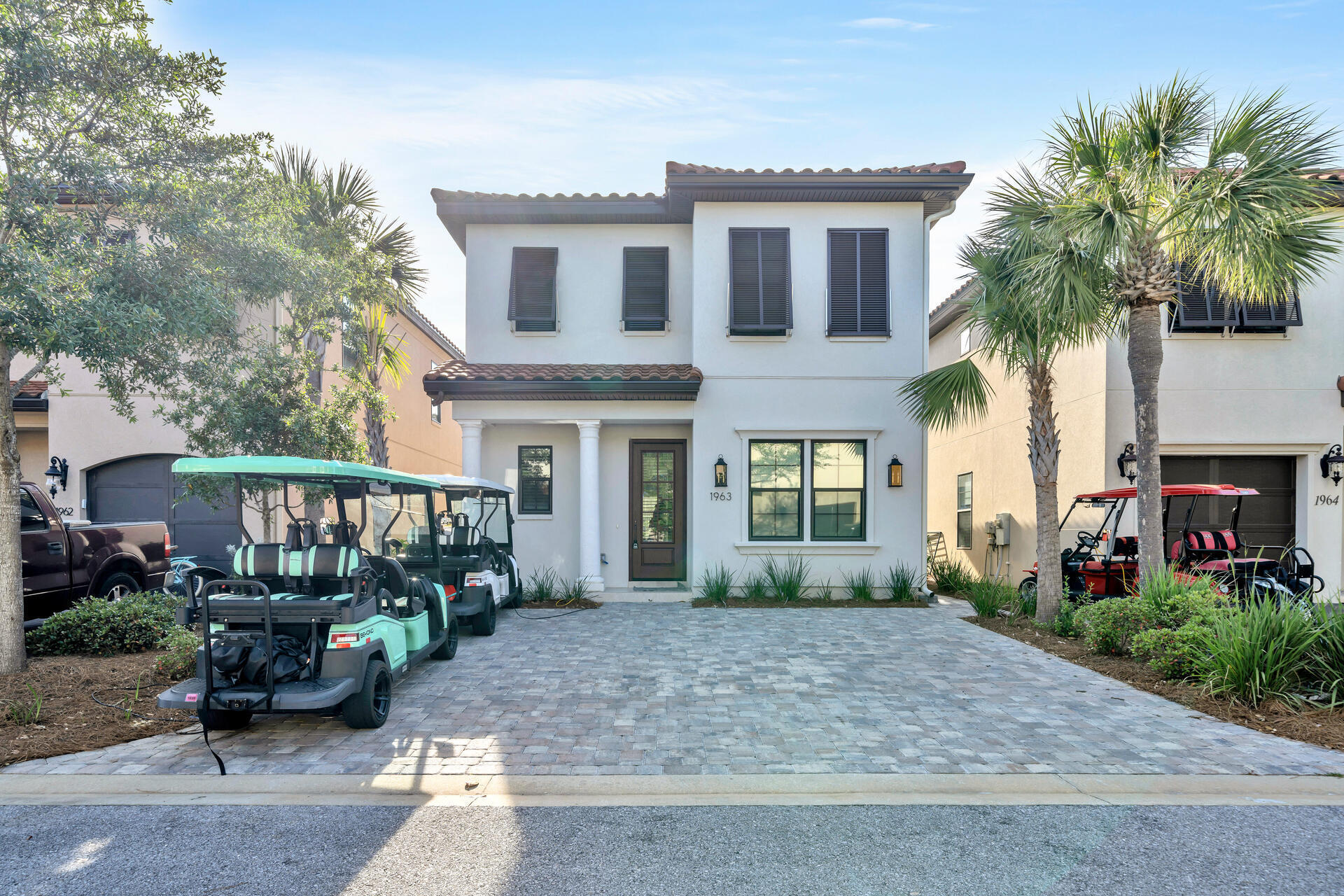 Experience coastal luxury in this fully furnished 2-story Villa Lago home, built in 2023, in Sandestin Golf & Beach Resort. The open-concept design features luxury vinyl plank flooring, abundant natural light, and a gourmet kitchen with quartz countertops, double oven, and glass French door pantry.The main-level primary suite includes a spa-like bath with freestanding tub and walk-in shower, plus access to a screened porch overlooking the lagoon. Upstairs offers a second primary suite, two guest bedrooms with private baths, and a versatile loft.Additional highlights include custom closets, Bluetooth-equipped bathroom fans, an EV charging outlet, outdoor shower, fenced yard, and the added convenience of two golf carts. This property is ideal as a primary residence or short-term rental. Within Sandestin's gates, residents enjoy four championship golf courses, 15 tennis courts, a 226-slip marina, pickleball courts, a fitness center, spa, shopping, and dining. Outdoor enthusiasts will love the miles of biking and walking trails, kayaking, paddle boarding, boating, fishing, and unforgettable sunset cruises. And of course, more than seven miles of pristine beach and Bayfront - all accessible by golf cart - make every day feel like vacation.