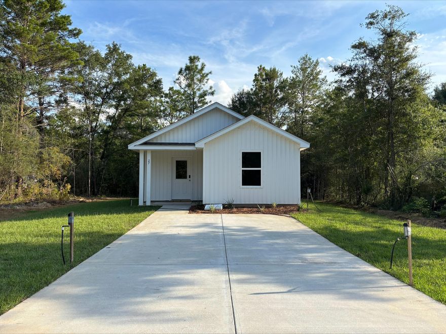 New construction home by Century Complete, a top 10 US homebuilder!  The new Mossy Head Community. The Carolina Plan beautifully crafted home offers modern living in a smart layout. An open concept floor plan connects the living, dining and kitchen areas. The kitchen boasts brand-new stainless-steel appliances and lots of counter space. The primary suite includes a private bath, while the second bedroom is perfect for guests or a home office. Don't miss this opportunity to own a new home with builder warranty! Closing cost credit and/or rate buydown available on select homes! Convenient to Crestview, Defuniak Springs, and I-10, our Mossy Head homes offer tremendous appeal and great location