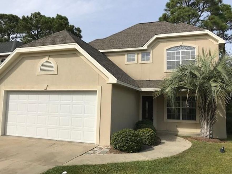 Nestled between the beautiful Gulf of Mexico and the Choctawhatchee Bay this charming home really does have it all--quiet & tranquil, yet convenient to everything! Only minutes from Silver Sands Outlets and Destin Commons! Approximately 1/4 mile from Legion Park with playgrounds, picnic pavilions and boat ramp! The back porch overlooks sprawling acreage & tall pines. Renovations include granite countertops, custom tile backsplash, light fixtures & LG S/S appliances. Half-bath updated also. Floor plan is open and airy with lots of natural light. The Master Bedroom & back bedroom open on to breezy terrace. Quiet street with one-way traffic! Levolor blinds! Kitchen features walk-in pantry, island & under-stairs storage! Built-in workbench in garage! Truly a gem!