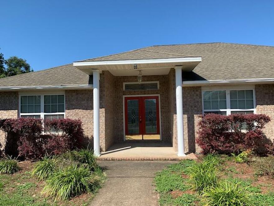 REDUCED! And a brand new roof! Beautiful brick home in Lee Farms with 4 bedrooms and 2 baths. Oversized side entry garage with 18' door. Spacious and open with crown molding in great room, dining room and master bedroom. Treyed ceilings in master and dining.  Flooring is ceramic tile and carpet. Large eat-in kitchen plus formal dining room.  Large pantry. .Master bath has dual vanities with separate tub and shower.  Walk-in master bedroom closet.  Interior laundry room. Sprinkler system. Privacy fenced backyard and screened in back porch., HVAC 2014 .  New HWH. .Storage shed as is.