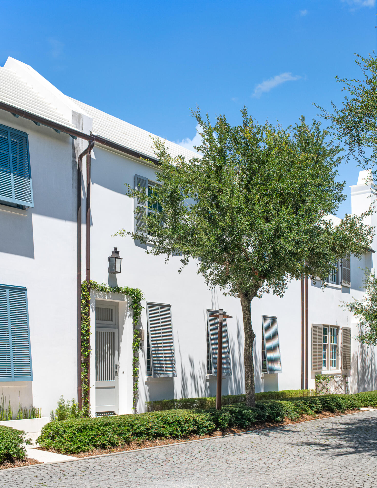This classic Alys Beach courtyard home design by Gary Justiss Architect is located on iconic N. Charles Street. This three bedroom, three and one half bath home offers a first floor primary suite, a generous courtyard with pool and summer kitchen, open loggias, and a rooftop terrace. Professional interior designs by Betsy Brown give the interiors a tasteful and contemporary feel. Interior details such as Venetian plaster walls and ceilings, Carrara marble throughout the kitchen and bathrooms and upgrades Wolf and Sub-Zero appliance elevate this beautiful home.