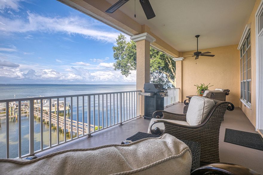 BAYVIEWS AND BOATS!  Rare opportunity to own an affordable, updated condo that includes a BOAT SLIP & BOAT LIFT!  Located on the bayside of Destin, its just a quick ride to Crab Island or continue further south to the Gulf of Mexico.  A Panoramic view of the bay may produce an instant 'wow' response as you open the front door.  Updated kitchen and living rooms reveal a long list of impressive updates including QUARTZITE STONED WALLS and EPOXY-METALIC COATED COUNTER TOPS (you gotta see this. full list in documents). A SOUNDPROOF BARRIER protecting occupants from virtually all neighbor noise has been installed in both living and bedroom walls. The highlight of the unit is an oversized patio overlooking stunning views of the bay and large enough to accommodate both a seating and dining areas