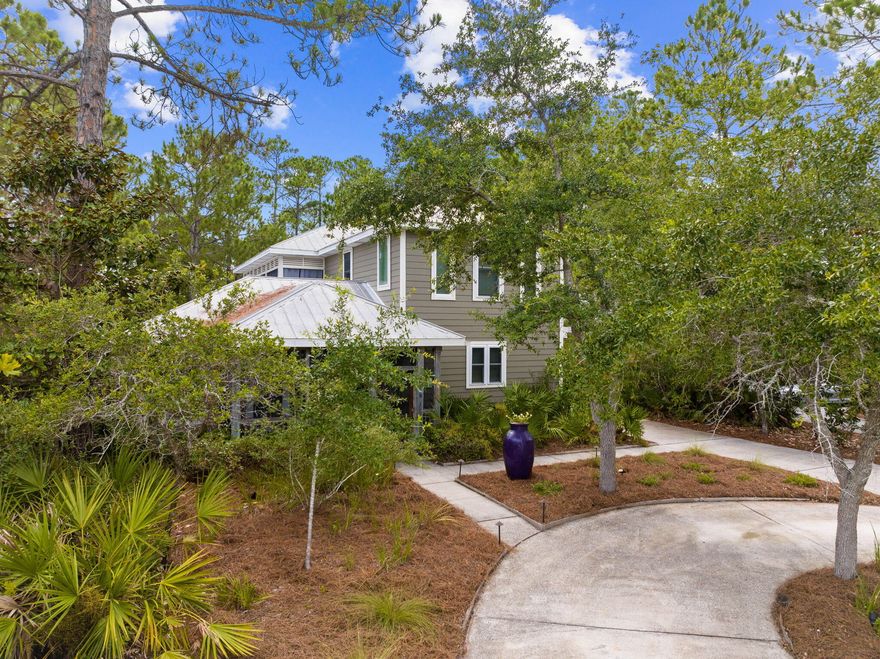 Presenting a remarkable opportunity in the heart of Seagrove Beach, this home is located in the highly sought-after neighborhood of Sugarwood. Renowned for its large lots and incredible beach access, Sugarwood offers a direct and uninterrupted path to the stunning shoreline just south of the property. Unlike gulf front owners in this area, there are no concerns about being restricted from accessing the beach, as ownership does not extend to the water's edge. This is one of the many reasons why Seagrove Beach is currently a hot market, embodying the visionary spirit of its founder, Cube McGhee.237 Wood Beach is a home that ticks all the boxes, making it perfect for primary residency, secondary vacation use, or as a rental investment. It is one of the few locations along 30A where you can rent the property and later retire to it. The abundance of large lots in this area offers a luxury that is rarely seen elsewhere. Additionally, you have the option to rent out the main home while keeping the carriage house available for your personal use, ensuring you always have a place to retreat to the beach even when the main home is rented out. The current seller successfully rents out the carriage house and self-manages the entire property.

Upon arrival at 237 Wood Beach, you will be greeted by ample parking space and lush, indigenous landscaping that enhances the property's curb appeal. Stepping inside, you'll find an oversized living space that seamlessly connects to the dining area and kitchen. This level also includes a bedroom with a connecting bathroom, ideal for accommodating guests. Upstairs, there is an office area with a bathroom that can easily be converted into a bunk room. Please consult with the agent for further details. The master suite is located down a spacious hallway and opens up to a large porch overlooking the outdoor area with a pool. The master bathroom has been recently updated and boasts a luxurious steam shower.

In addition to the main house, this property features a separate carriage home that offers a generously sized, air-conditioned garage space. You'll have plenty of room to store your beach toys or even set up a pool table. The carriage house itself is simply stunning, and since it is rear-loaded, it provides privacy and serene views of the adjacent conservation area. The carriage house includes a full kitchen and a bedroom, adding flexibility and versatility to the property.

237 Wood Beach is just a short stroll away from the pristine beaches of South Walton and conveniently situated east of the world-renowned town of Seaside.