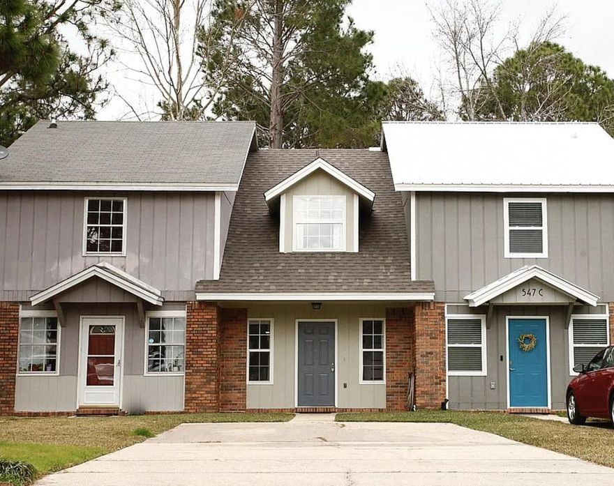 Please consider this well-maintained two-story middle-unit townhouse, which offers a functional layout and exceptional value with no HOA in Fort Walton Beach, Florida! The home features 2 bedrooms and 1.5 bathrooms, with both bedrooms and the full bathroom located upstairs for added privacy. The main level includes the living room, dining area, kitchen, laundry, and a convenient half bathroom. The property offers ample parking with a driveway that can accommodate up to four vehicles, a rare find for townhouse living. Out back, enjoy a private, fully fenced yard complete with an open deck porch Conveniently located less than 2 miles from FWB's Hospital and other medical services, approximately 7 miles from Eglin AFB, 7.5 miles from Hurlburt Field, and just 15 miles from the beaches of Destin, this home offers both accessibility and lifestyle appeal. Whether you're a small family, first-time buyer, military member, or investor seeking a strong rental opportunity, this property checks all the boxes.