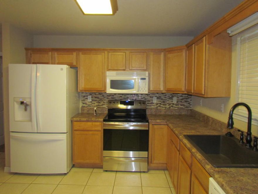 AVAILABLE NOW!!! Well maintained home on a huge lot affording privacy and tranquility. This home features 2 bedrooms and 2 full baths in a split floor plan. The open concept floor plan provides a light and airy feel to the house. Home features a screened in Lanai and a nice back porch making entertaining a breeze. Location provides easy access to the Mid-Bay bridge, EOD school, and Eglin AFB. Sorry, no indoor smoking and no pets.