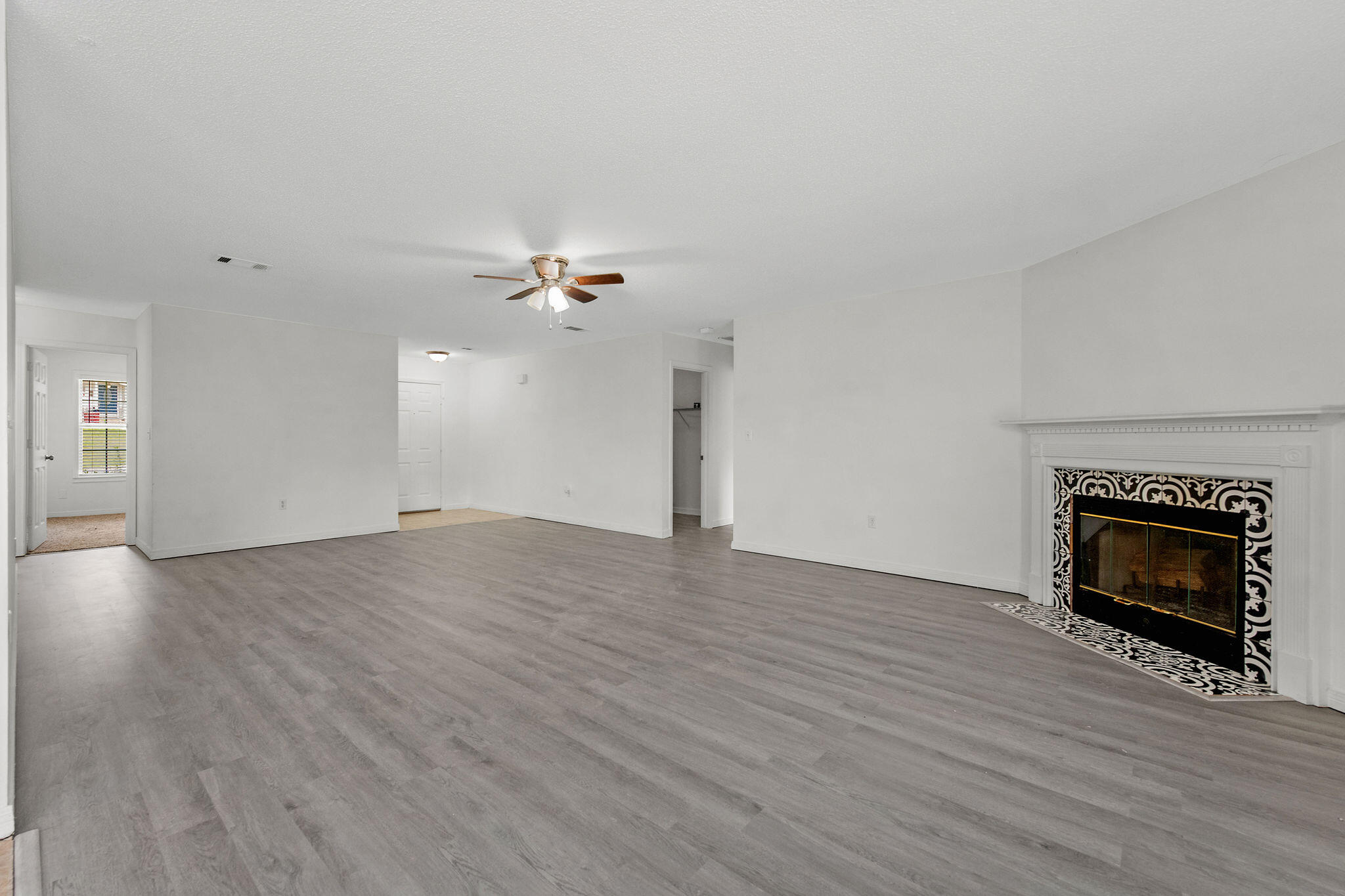 Updated flooring!Discover this charming 3-bedroom, 2-bath home nestled in Crestview, offering comfortable living and inviting features. The residence includes a spacious 2-car garage and a generously sized living/dining combo area enhanced by a cozy fireplace.The roomy kitchen provides ample space for culinary endeavors, while the split bedroom layout ensures privacy for all residents. Both bathrooms are notably large, adding to the home's appeal and functionality.