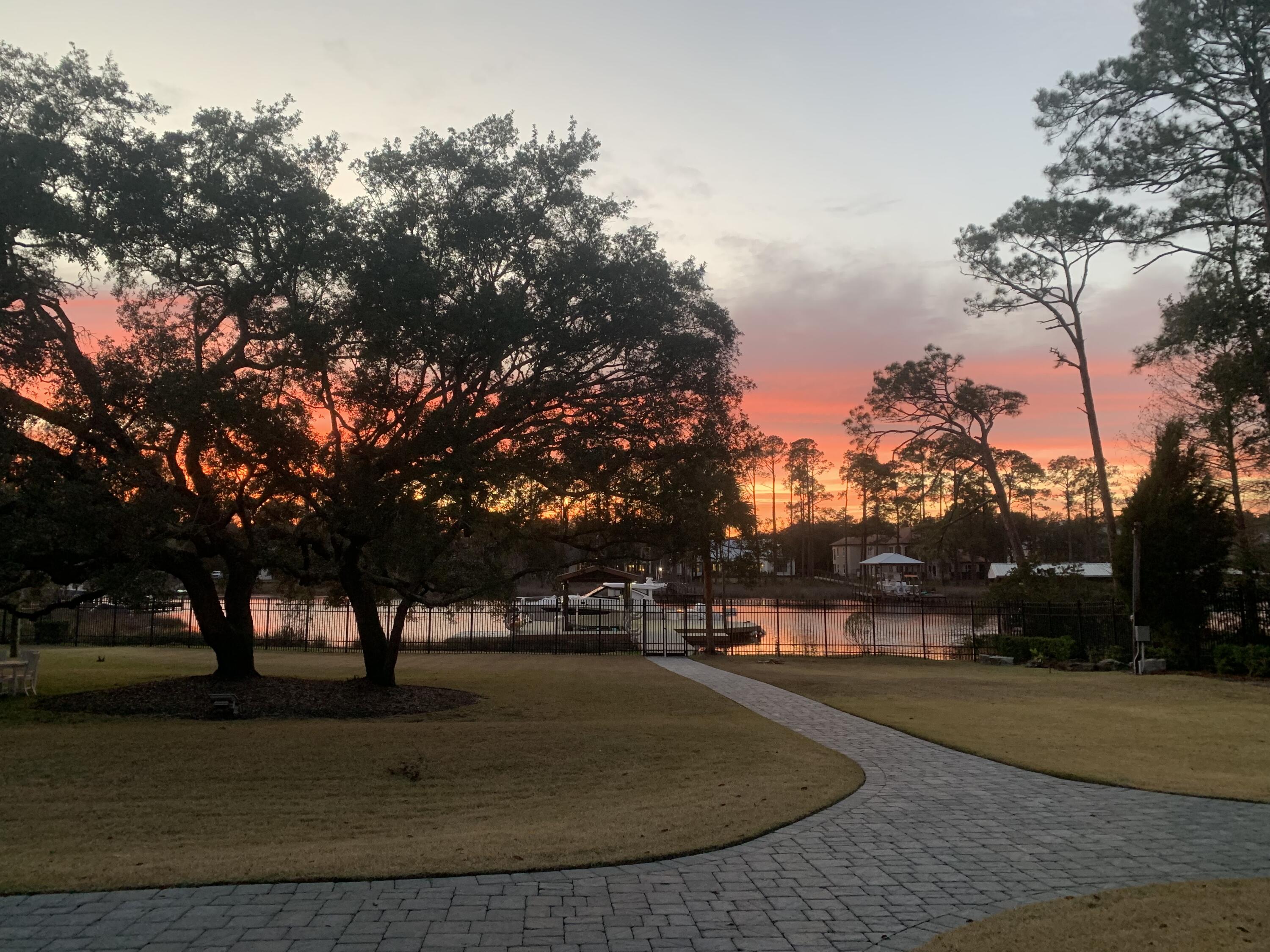 Welcome to Grace Cove By The Sea. This magnificent home had 3M plus in renovations, inside and out, completed the end of 2022. This home is built with concrete and steel. Must see to appreciate this 2.5 acre fully fenced, gated private estate. NO HOA!! Convenient to shopping, hospital, restaurants. Living the South Walton lifestyle with your boast and jet skis, sitting on your private dock behind your house. Peace and tranquility at its finest.