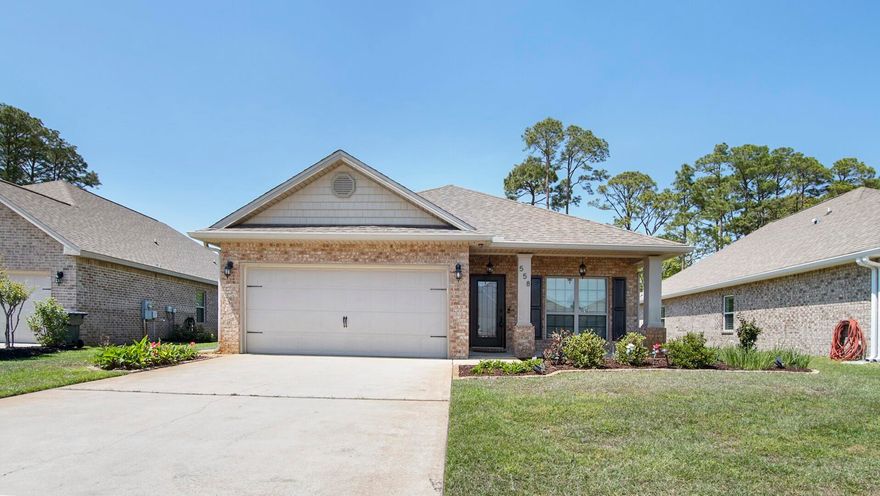 Welcome to your coastal Craftsman-style home, w/ PAID IN FULL SOLAR, in the sought-after Driftwood Estates! This 3BR, 2BA gem offers an open floor plan, granite counters, SS appliances, tray ceilings, crown molding, a custom wine bar, hurricane shutters, and an epoxy-finished garage with built-in storage. Enjoy two screened-in porches and an entertainer's dream backyard with an outdoor kitchen--featuring two grills, a smoker, bun warmer, and solar lights. Lush landscaping includes a fruitful grapefruit tree, The fully paid-off solar panels, keeping utilities averaging $25/mo. Community includes: a pool, large park w/ trails, pickle ball & tennis courts & more!