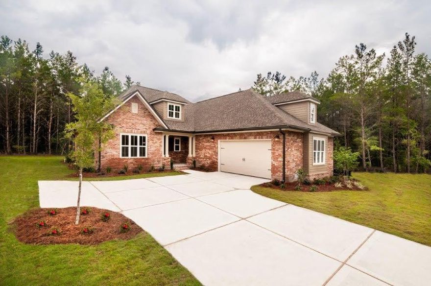 The Hawthorn plan has 2,348 square feet, 3 bedroom, flex room with wood glass french doors and 2 1/2 baths. Brick exterior, low E-vinyl windows, covered rear porch and a 2 car garage. Interior finishings include, 9' ceilings, granite counter tops, laminate, tile and carpeted floor coverings, crown molding, cased windows and openings. Natural gas range and Rannai tank water heater. Stainless Frigidaire appliances, WoodHarbor cabinets. Additional upgrades include base and upper cabinets with sink in laundry room, drop zone cabinet, laminate in flex, extended island w/ legs, floor plug in living room and ceiling fan on back porch. Fence included!! Hammock Bay is a 3,200 acre master planned development which offers a clubhouse, movie theater, pools, workout facility and nature trails.