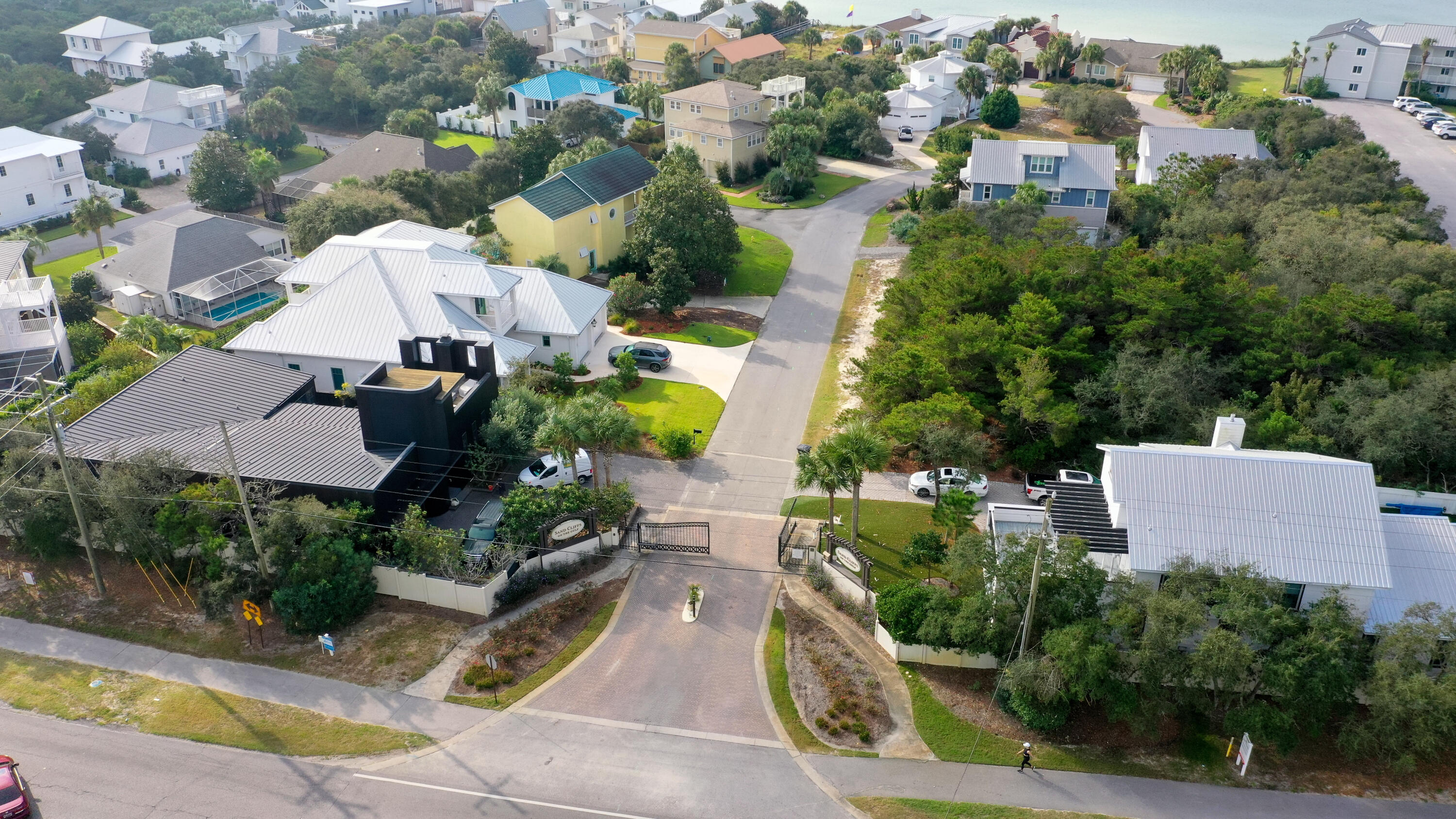Fantastic lot located in the gated non-rental neighborhood of Sand Cliffs.  This neighborhood is known for its laid back style and ease of access to shopping and restaurants.  Deeded access to the beach.