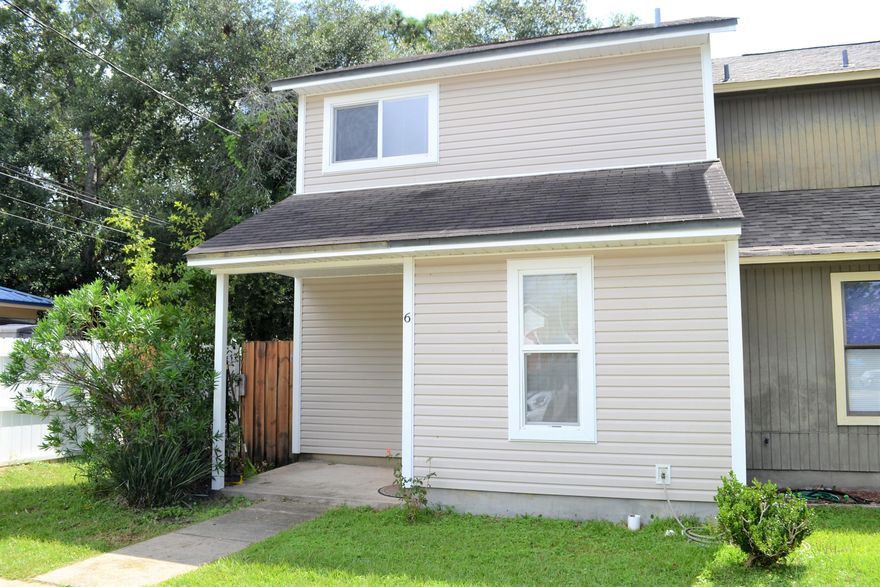 Won't last long at this price! End unit in a 3-unit building with NO HOA! New energy efficient windows, keyless entry front door, new water heater, updated bathrooms, laminate flooring downstairs/newer carpet upstairs. Large fenced-in backyard with shed. Utility/storage room off the patio.