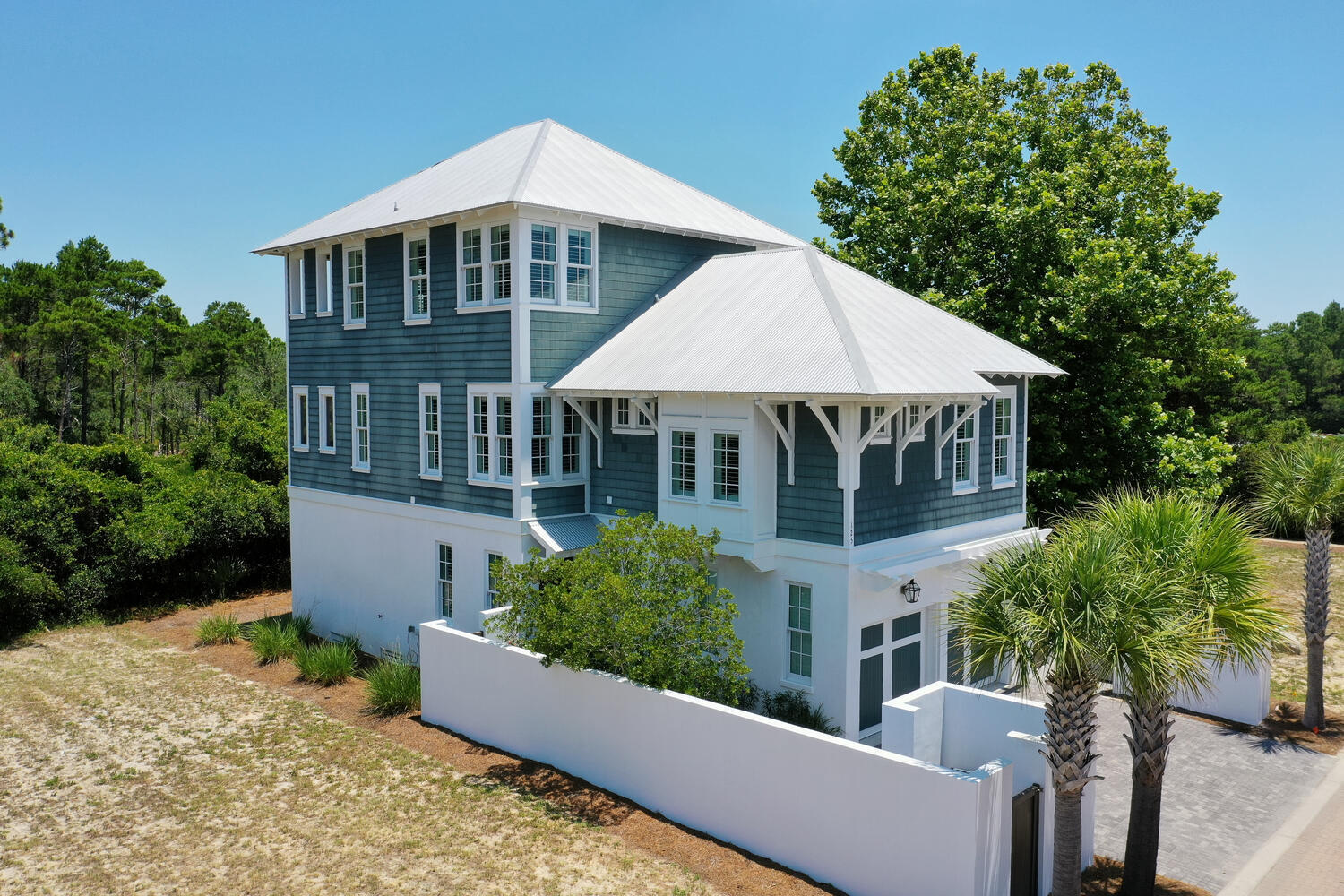 Looking for a luxurious beach home? This is it! Deeded beach access is so close. This 3 story, 4 bedroom, with 3 of them being Master bedrooms, open concept home is the perfect place for full time living, second home or an investment property. As you drive up to this beautiful home, you will see that there is plenty of parking and a 2 car garage. As you step in the front door, you are greeted by a friendly entry area to kick off your flip flops and hang up your towels. There are 2 bedrooms, one with two twin beds and the other with a King sized bed. Both bedrooms have their own private bathrooms. There are large closets in each bedroom and they are well decorated.