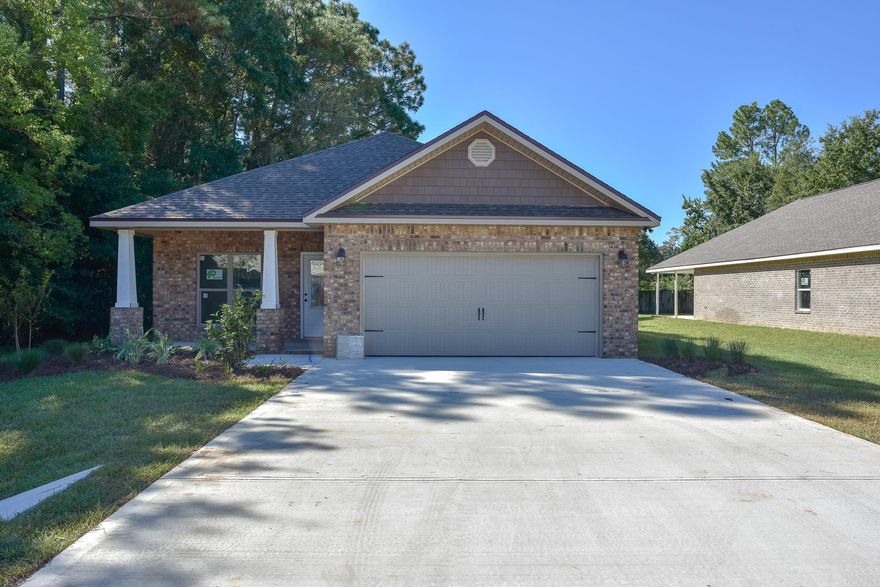 Brand New 4bed/2bath home by a local builder. In the craftsman style, this home offers all the comforts and conveniences of modern living: QUARTZ/GRANITE counter-tops; custom, SOFT-CLOSE shaker/traditional style all-wood cabinets; large walk-in pantry, and large central island w/ breakfast bar. Main living area(s) vinyl plank flooring, with tile in the bathrooms & FRIEZE carpeting in the bedrooms. This custom home also includes: 9-11' ceilings, CROWN, tray ceiling, and arched walkways.