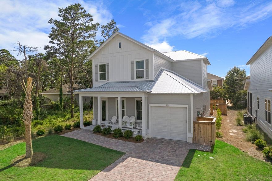 Enjoy the Rosemary Beach lifestyle for a fraction of the price! The Preserve at Inlet Beach is an upscale coastal community with less than 70 homes, a quaint feel, private pool, and dock access to Lake Powell.  Completed at the end of Summer 2021 this home is only 1 year old.  The zero-step entry and first floor master are a rare find for the area.  The kitchen showcases snow white quartz countertops, shaker-style cabinetry, large built-in pantry, and farmhouse sink.  The bathrooms have quartz countertops as well and large tile showers.  The gorgeous flooring is light and airy Mohawk RevWood Plus with maximum scratch protectant, waterproof and lifetime guarantee.  The large backyard is fully fenced with an incredible 700 sq ft stone patio with built-in fire pit and oversized charcoal grill