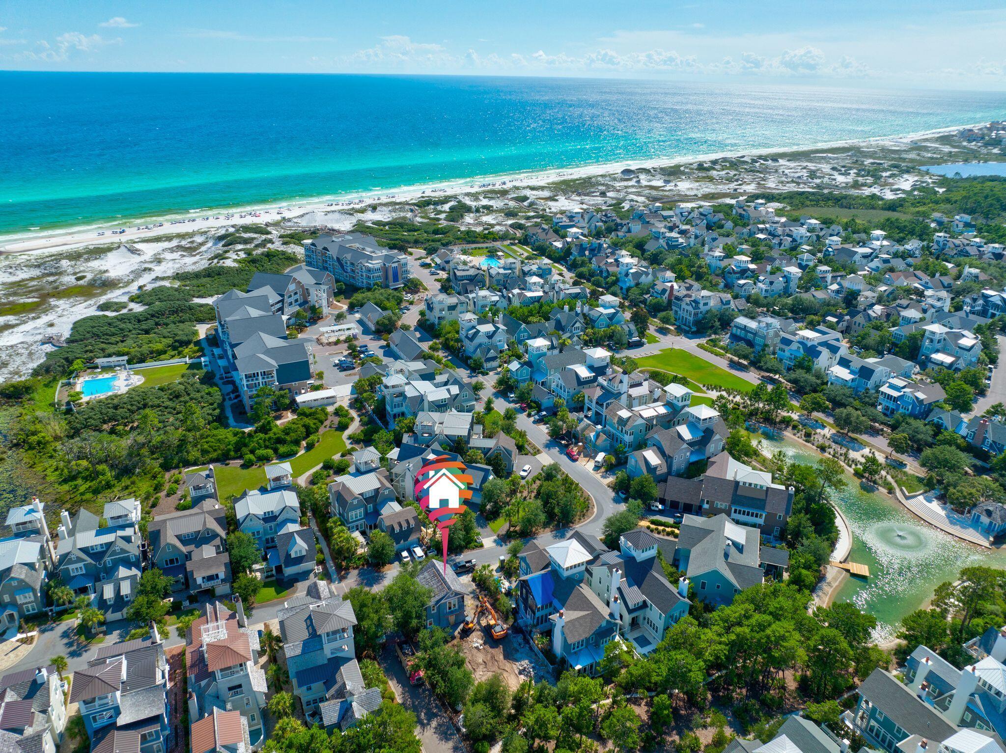 Residing behind the private gates of WaterSound Beach within the Crescent Keel District, this prime development opportunity is poised seconds from the white sugar sand and surrounding iconic town centers of 30A including Seaside, Alys Beach, and Rosemary Beach. The 110' deep homesite offers space for a stately edifice while remaining ideally positioned to take full advantage of the view corridors above showcasing the turquoise-hued waters and famed Emerald Coast sunsets. The existing coach house nestled atop the two car garage is nicely appointed throughout and features a kitchen, sleeping quarters, and bathroom suite providing immediate accommodations that can be utilized throughout the build-out process of the main residence.