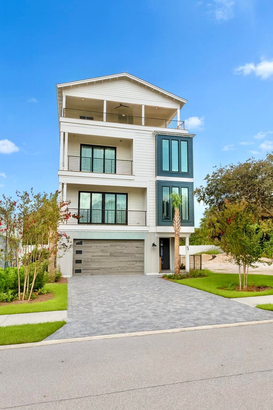 Brand new, just completed...Gorgeous four-story rental dream, south of 30A on Mary Street in Blue Mountain Beach. Perfect for indoor and outdoor entertaining with less than a 5 minute walk to the beach, the house features rental income projections of around $235,000.  Designed with vacation in mind, the first level includes a half bath and mini kitchen with a full sliding wall that opens to the pool deck. The second floor features the spacious kitchen, dining and living area, perfect for large families or parties to gather. The kitchen features Thermador appliances, a gas stove, ample counter space for serving, and a walk-in pantry. The third floor boasts a lovely master suite with a private balcony.