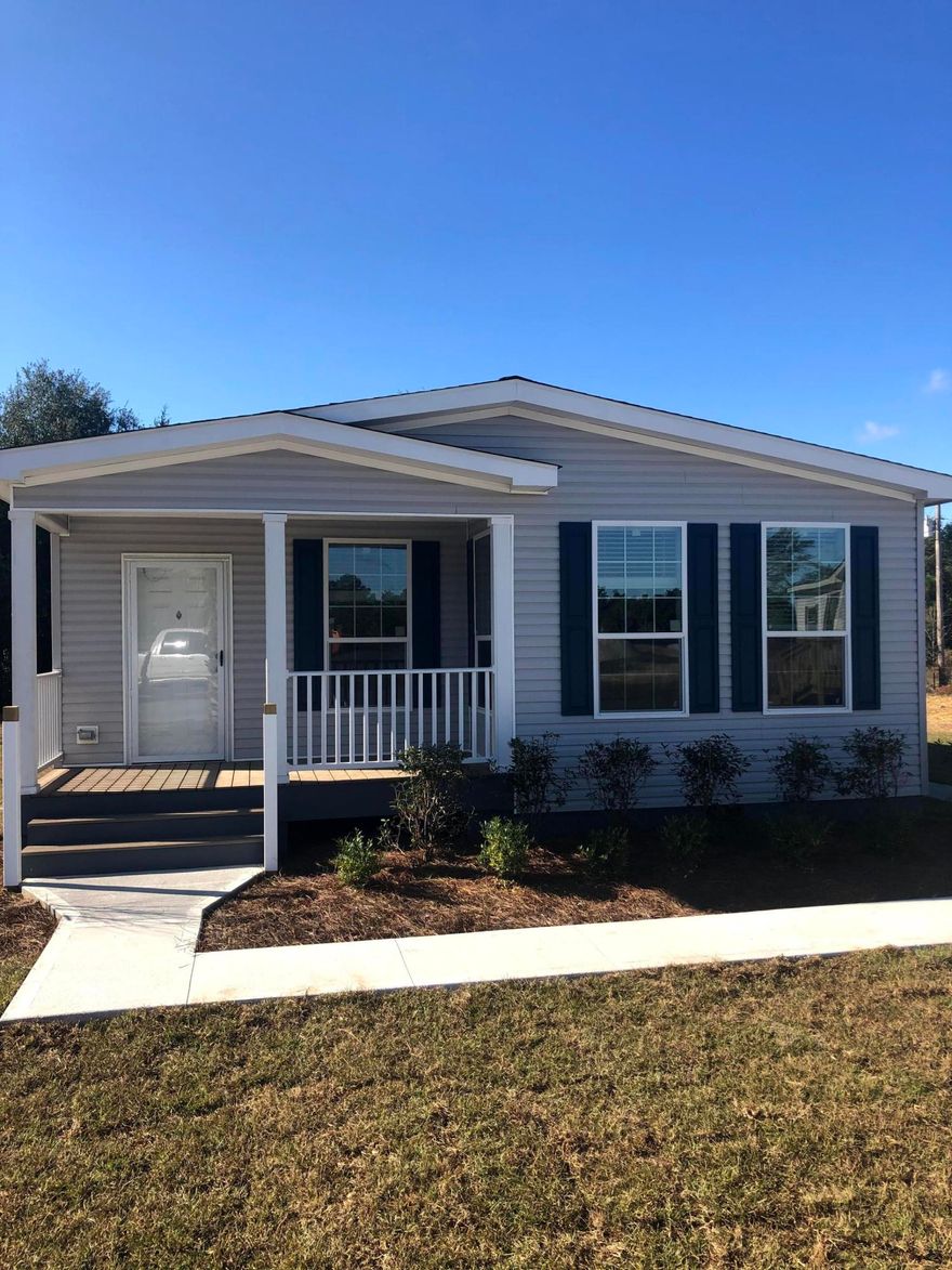 High quality stick built modular home community.  Homes framed with 2x6 studs and 2x10 #1yellow pine floor joists with crawl space and solid continuous concrete, steel reinforced, foundation.  Home has a front porch which leads to a spacious, open living and dining area with a large kitchen.  Lot is a little over 1/4 acre and has underground electric, Argyle Water System, septic tanks, paved roads, 4 miles from town.