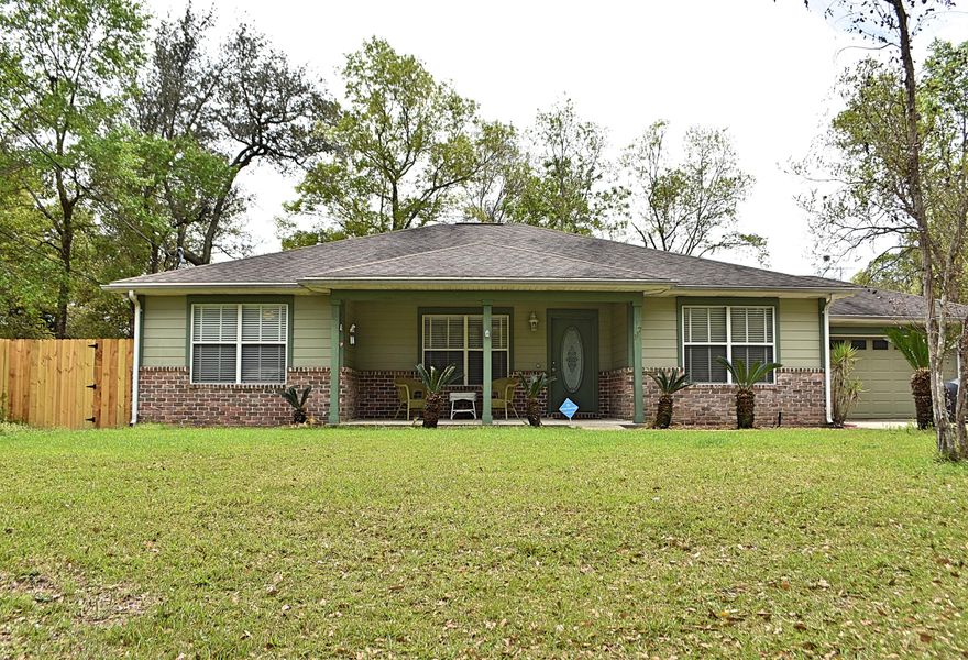 Beautifully maintained three bedroom 2 bath home located on a large .29 acre, secluded lot at the end of the street. Tile flooring throughout the home, with upgraded Samsung dishwasher with stainless steel tub, New fencing, well pump and irrigation well and sprinkler system installed for easy maintenance of the landscaping. Looking for a well priced home in a great location? Look no further, this property is conveniently located between Niceville and Freeport. There is a screened porch and storage building to hold your lawn equipment while keeping your garage free to hold your vehicles. Samsung Front Load Washer and Dryer with pedestals also convey. Survey available.