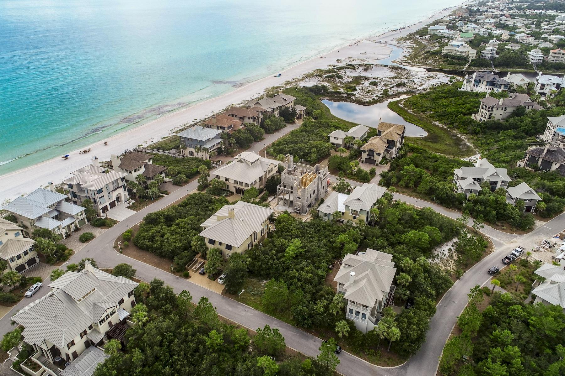 This amazing homesite in the exclusive, gated community of The Retreat is for sale and ready for a vacation home to be built and includes plans. The Retreat consists of 90 acres of premium, luxury homes and home sites south of Scenic 30A in Blue Mountain Beach, FL. Approximately half of the 90 acres is designated green space and there is 3,000 feet of pristine beach front for your enjoyment. The Retreat has a Beach Club with infinity edge pool and pool deck with jacuzzi which is perched on the sugar sand dunes overlooking the Gulf of Mexico. Owners also have access to their very own storage locker underneath the pool perfect for beach gear, yolo boards, bikes, etc. Draper Lake rests on the west side and is ideal for paddle boarding, canoeing and fishing. There is no build-out time to begin