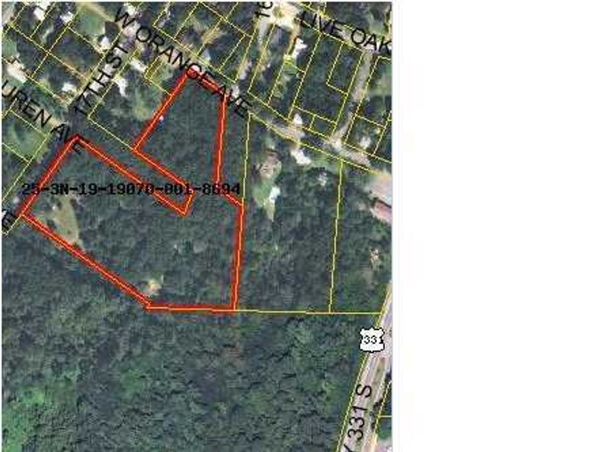 REDUCED. 7.1 commercial acres zoned Multi-Family Residential (R-2) in downtown de funiak Springs approx. 500 Ft. West of 331 and approx. 1250 Ft. South of Hwy 90. By the city of De Funiak Springs, 16 units per acre for a total of 113 units. 155 Ft. of frontage on Orange Ave. and 657 Ft of frontage on 17th St. Flood zone X.