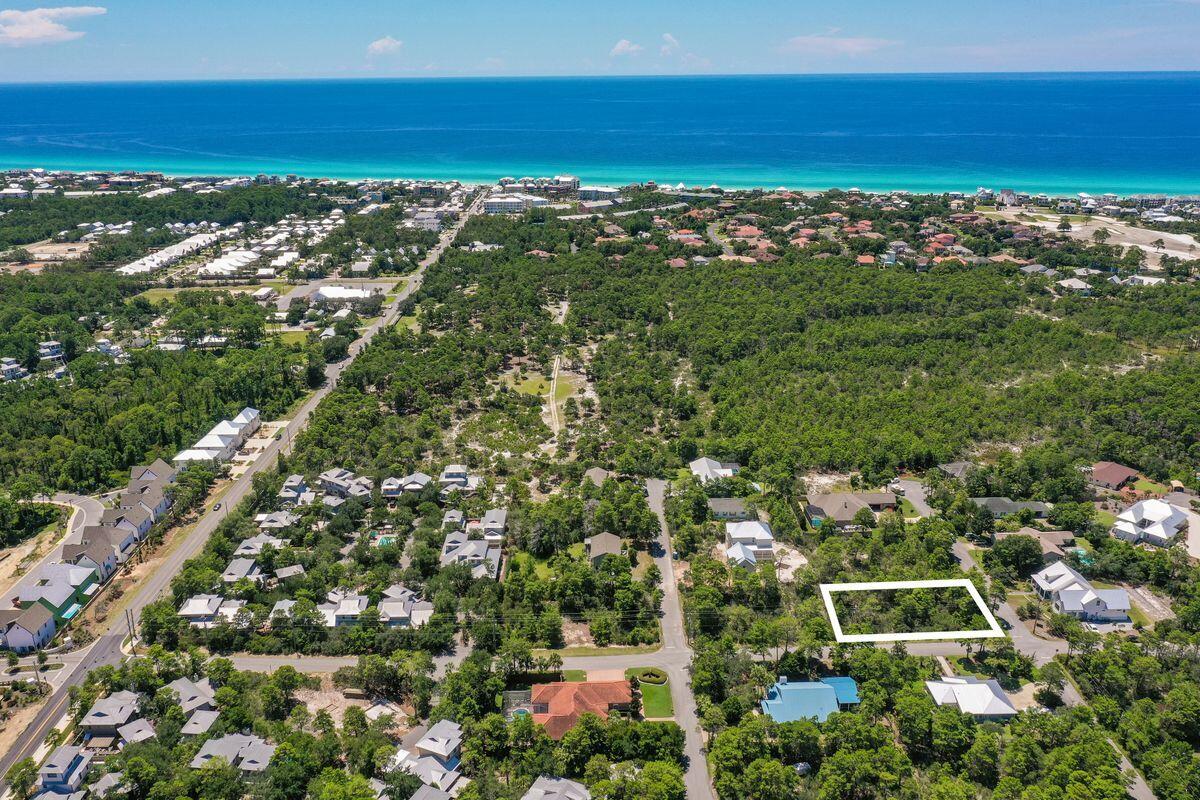 Phenomenal large corner lot just minutes to the Gulf of Mexico. Positioned on a high and dry lot that rarely comes available in Santa Rosa Ridge with no HOA. Picture your forever beach home in the tranquil setting of Blue Mountain Beach. There is a new multi use golf cart path leading directly to the Ed Walline beach access. Also, a short ride to the Santa Rosa Beach Golf Club. This location is ideal for a primary, secondary, or investment rental property with no community rental restrictions. In addition for convenience: shopping, dining, and entertainment is moments away at the Gulf Place Town Center.