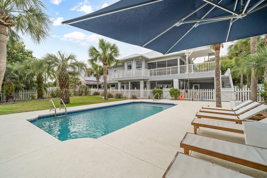 Seller will consider contributing up to $50K toward Buyer closing costs/rate buy down with an accepted contract! Step into coastal luxury with this beautifully remodeled and fully furnished Serena and Lily-inspired beach house tucked away on a rare nearly half acre of tropical lush landscape just steps from the sugar white sands of Inlet Beach just outside of Rosemary Beach. Surrounded by mature palm trees, this tropical retreat features an expansive 32-foot pool, multiple sun-soaked decks, and private deeded beach access that leads you straight to the Gulf of Mexico. Designed for flexibility and comfort, the home offers two separate private lock-out units, each complete with its own kitchen, laundry, and living quarters--ideal for large families (sleeps 16+), vacation rentals, or