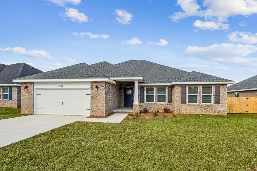 New construction in Clearwater Landing! The Liberty is a spacious 4-bedroom, 2-bath home featuring an open layout with vaulted ceilings and modern finishes throughout. The kitchen offers stainless steel appliances, granite or quartz countertops, slow-close cabinetry, an island, and a large pantry. The split floor plan provides added privacy, with the primary suite including tray ceilings, double vanities, a tiled walk-in shower, and a garden tub. The fourth bedroom offers flexibility as an office or playroom. Crown molding accents the main living areas, and blinds are included. Located in one of Milton's newest communities with large homesites and convenient access to Navarre and Pensacola. Home will be move in ready by 10/8/2025.