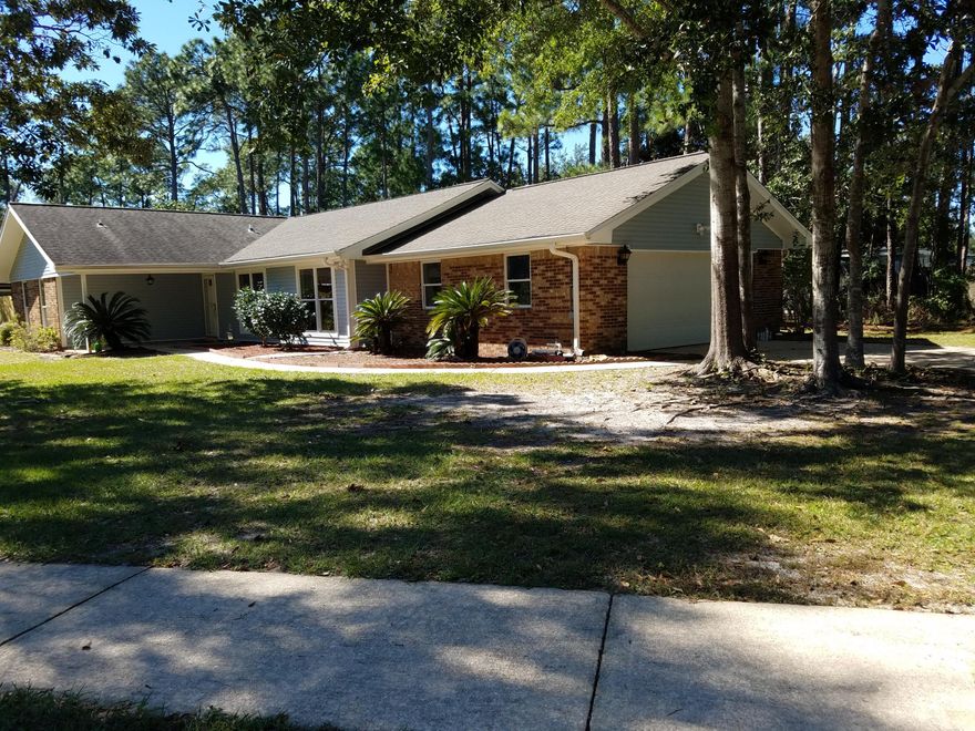 UPGRADES***UPGRADES***PRICE TO SELL!!! Located in a quiet neighborhood in central Niceville. Some of the upgrades include new stove 2017, backsplash 2017, garbage disposal 2017, carpet 2017, garage door opener 2017, doors 2017, ceiling fans 2017, well pump 2017, freshly paint throughout; beautiful tiles installed in 2014.New roof in 2006. As you step on the foyer, to the right, you will be welcomed by the family/dining area that connects to the kitchen by a breakfast bar. To the left of the kitchen you will see the great room, enhanced by a comforting fireplace. The door on left of fireplace leads to the newer added Florida room, which offers a relaxing view to the private backyard. Mature pine trees offer shade and ornament the backyard