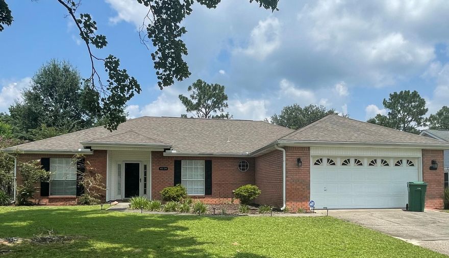 South of I-10.  This well maintained 3 bedroom 2 bath home is waiting for you.  As soon as you walk in the door you will notice the dazzling Plantation Shutters through out the home and the exquisite laminate flooring through out the living area.  Large tile in the kitchen, and carpet in all the bedrooms.  The Large Living room (20 x 18) has a cathedral ceiling, fire place and  3 open arches to the formal dining area.  Kitchen has plenty of room with lots of space for storage, breakfast bar, and nook. Master Suite has boast plenty of room for your large furniture  with a walk in closet in the master bath.  The covered back porch area is perfect for your gathering with family and friends.  Lots of room in the back yard for the kids to play, or just enjoy the fire pit with your loved one.