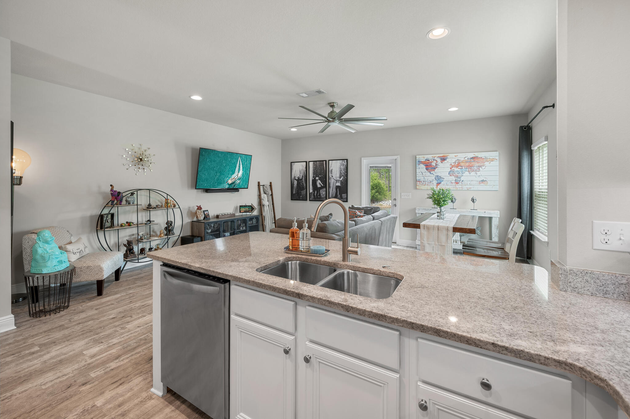 Location is key here for this beautiful end unit townhome in Santa Rosa Beach! Unit F features 3 bedrooms and 2.5 baths along with a 1 car garage. This home boasts tons of charm and an open concept, as well as a long list of upgrades! Upgrades include: luxury flooring throughout, shiplap accents, custom barn door in the owner's suite, and a 9' X 20' deck. The kitchen features granite countertops, beautiful white cabinets with under cabinet lighting, premium fixtures, and stainless steel appliances. Upstairs, you'll find all 3 bedrooms, 2 full bathrooms and your laundry room conveniently located in the hallway. Out back, relax in peace on your private deck, and enjoy some privacy along with the pond and forest views.