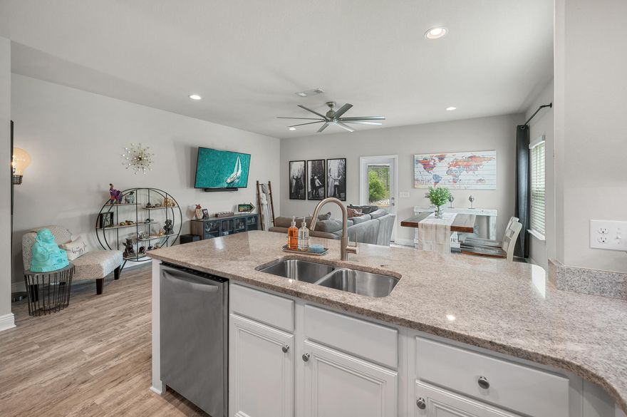Location is key here for this beautiful end unit townhome in Santa Rosa Beach! Unit F features 3 bedrooms and 2.5 baths along with a 1 car garage. This home boasts tons of charm and an open concept, as well as a long list of upgrades! Upgrades include: luxury flooring throughout, shiplap accents, custom barn door in the owner's suite, and a 9' X 20' deck. The kitchen features granite countertops, beautiful white cabinets with under cabinet lighting, premium fixtures, and stainless steel appliances. Upstairs, you'll find all 3 bedrooms, 2 full bathrooms and your laundry room conveniently located in the hallway. Out back, relax in peace on your private deck, and enjoy some privacy along with the pond and forest views.
