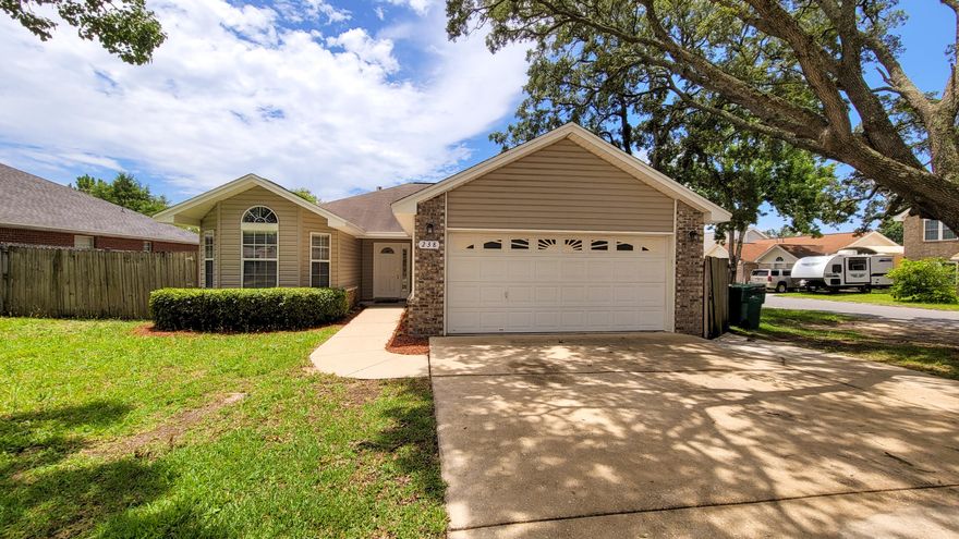 MOVE-IN READY 3 BR home in the heart of Fort Walton Beach! Inside, appreciate the wood flooring in living/dining area and raised ceilings for added space and character. The living room has a gas fireplace with mantle. Through the living room is the dining/kitchen. The L-shaped kitchen is spacious and has a breakfast bar and pantry, and the dining room is where one can walk out to the large covered patio and grassy fenced-in backyard. Perfect for entertaining! Back inside, the master bedroom is off the dining room away from the other bedrooms. It's carpeted and has a private full bathroom with walk-in closet. Across the home are two additional bedrooms (one has a large bay window that would be great as an office space if needed!) and a full bathroom with linen closet. See more --->