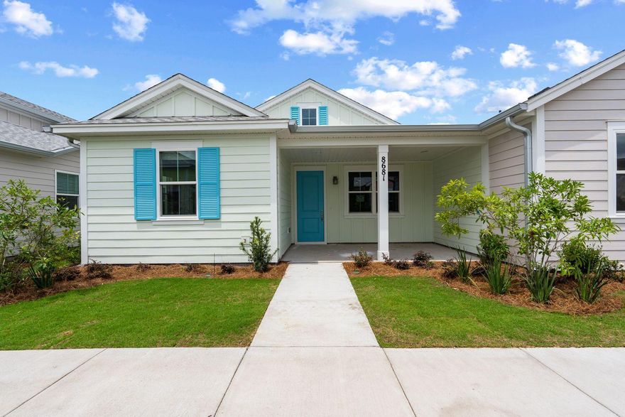 Introducing Latitude Margaritaville WaterSound, the Emerald Coast's newest active 55 and better community located minutes to the sugar white sandy beaches of the Gulf of Mexico. Situated behind the gates of this Jimmy Buffett inspired community, find 8681 Tropics Ave, a brand-new 2-bedroom, Camellia Cottage in Phase 4 that is to be completed by the end of June. Offering over $50K in upgrades and positioned with convenient access to the incredible future amenities, this fantastic residence provides a move-in-ready opportunity without the typical 2-year build time.