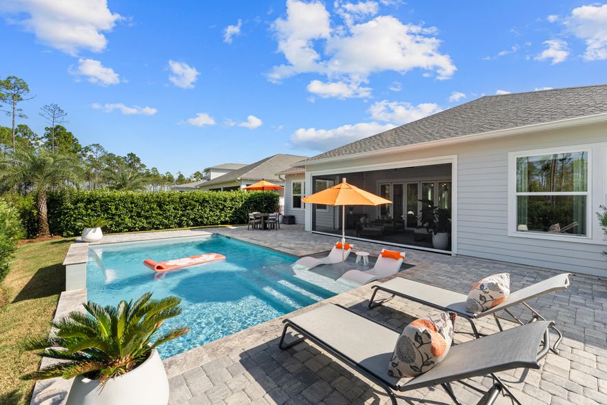 Welcome to Naturewalk at Watersound Origins, a luxury gated community along the 30A corridor offering exclusive resort-style amenities. This stunning 4BR|3.5BA Redington floorplan rests on a premium, ultra-private lot backing to a protected nature preserve delivering serene views & complete tranquility.  Thoughtfully designed for effortless single-level living, the open concept layout seamlessly blends indoor/outdoor spaces.  With over $250k in curated upgrades & offered FULLY FURNISHED, every detail has been selected for elegance and comfort.  Inside you'll find 10ft ceilings, 8ft doors, custom woodwork, Levolor top-down/bottom-up cellular shades & designer lighting which create a warm refined atmosphere.  Living Rm features beautiful wood beamed ceiling, built-in cabinetry, 5-panel folding glass doors that open to the Lanai complete with motorized, retractable screens-creating seamless indoor-outdoor living year round! You will fall in love with this dream Kitchen fully equipped with stacked cabinetry that stretch to the ceiling and custom layout upgraded with deep pot drawers, stainless steel appliance package with GE Caf?? 5 burner gas cooktop & wine fridge, premium quartz island with waterfall edge wrapped in shiplap, under cabinet lighting & water filtration system. 

Primary Suite is a true sanctuary tucked away at the rear of the home flooded with natural light & offering direct lanai access.  Spa-inspired bath boasts a soaking tub, walk-in shower, dual vanity & a showstopping custom closet designed with organization and style in mind!  Guest suites are equally refined, each with en-suite baths enhanced with wainscoting & elegant finishes.  Additional highlights include a spacious laundry room with tons of cabinetry, sink & custom coat closet - W/D stay, 2 car garage with EV charger outlet & additional refrigerator along with garage ceiling storage racks.
Step outside to experience the crown jewel of this home - a backyard oasis featuring a 14 x 26ft saltwater pool w/an 8 x 8ft tanning ledge, sheer descent waterfall, glass bead gunite finish and lush professional landscaping & lighting along w/sprinkler system - overlooking the nature preserve.  Whether hosting summer barbecues or enjoying quiet evenings under the stars, this outdoor retreat is the ultimate extension of your living space.

As part of Naturewalk at Watersound Origins, residents enjoy access to all Origins premier amenities including resort-style pools, hot tub, firepit, fitness centers, pickleball & tennis courts, walking trails, unlimited golf, playgrounds, access to Lake Powell w/complimentary kayaks for residents-all within this non-short-term rental community.  Additionally, at the neighborhood entrance, Watersound Town Center is growing and includes Publix, multiple restaurants, coffee shops and much more.  30Avenue, Rosemary and Alys Beach are just a short bike ride away!  Enjoy everything the sugar white sands of the Emerald Coast has to offer!
