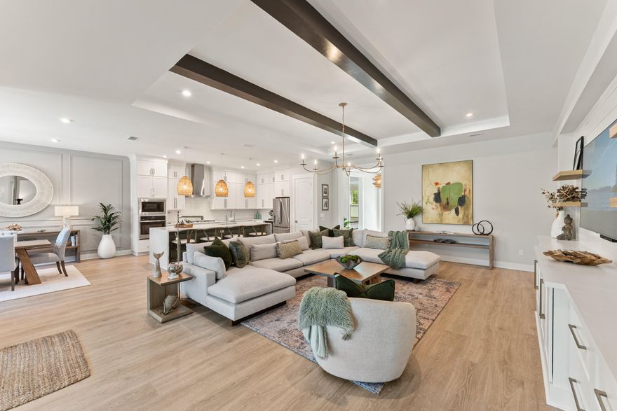 Welcome to Naturewalk at Watersound Origins, a luxury gated community along the 30A corridor offering exclusive resort-style amenities. This stunning 4BR|3.5BA Redington floorplan rests on a premium, ultra-private lot backing to a protected nature preserve delivering serene views & complete tranquility.  Thoughtfully designed for effortless single-level living, the open concept layout seamlessly blends indoor/outdoor spaces.  With over $250k in curated upgrades & offered FULLY FURNISHED, every detail has been selected for elegance and comfort.  Inside you'll find 10ft ceilings, 8ft doors, custom woodwork, Levolor top-down/bottom-up cellular shades & designer lighting which create a warm refined atmosphere.  Living Rm features beautiful wood beamed ceiling, built-in cabinetry, 5-panel folding glass doors that open to the Lanai complete with motorized, retractable screens-creating seamless indoor-outdoor living year round! You will fall in love with this dream Kitchen fully equipped with stacked cabinetry that stretch to the ceiling and custom layout upgraded with deep pot drawers, stainless steel appliance package with GE Caf?? 5 burner gas cooktop & wine fridge, premium quartz island with waterfall edge wrapped in shiplap, under cabinet lighting & water filtration system. 

Primary Suite is a true sanctuary tucked away at the rear of the home flooded with natural light & offering direct lanai access.  Spa-inspired bath boasts a soaking tub, walk-in shower, dual vanity & a showstopping custom closet designed with organization and style in mind!  Guest suites are equally refined, each with en-suite baths enhanced with wainscoting & elegant finishes.  Additional highlights include a spacious laundry room with tons of cabinetry, sink & custom coat closet - W/D stay, 2 car garage with EV charger outlet & additional refrigerator along with garage ceiling storage racks.
Step outside to experience the crown jewel of this home - a backyard oasis featuring a 14 x 26ft saltwater pool w/an 8 x 8ft tanning ledge, sheer descent waterfall, glass bead gunite finish and lush professional landscaping & lighting along w/sprinkler system - overlooking the nature preserve.  Whether hosting summer barbecues or enjoying quiet evenings under the stars, this outdoor retreat is the ultimate extension of your living space.

As part of Naturewalk at Watersound Origins, residents enjoy access to all Origins premier amenities including resort-style pools, hot tub, firepit, fitness centers, pickleball & tennis courts, walking trails, unlimited golf, playgrounds, access to Lake Powell w/complimentary kayaks for residents-all within this non-short-term rental community.  Additionally, at the neighborhood entrance, Watersound Town Center is growing and includes Publix, multiple restaurants, coffee shops and much more.  30Avenue, Rosemary and Alys Beach are just a short bike ride away!  Enjoy everything the sugar white sands of the Emerald Coast has to offer!
