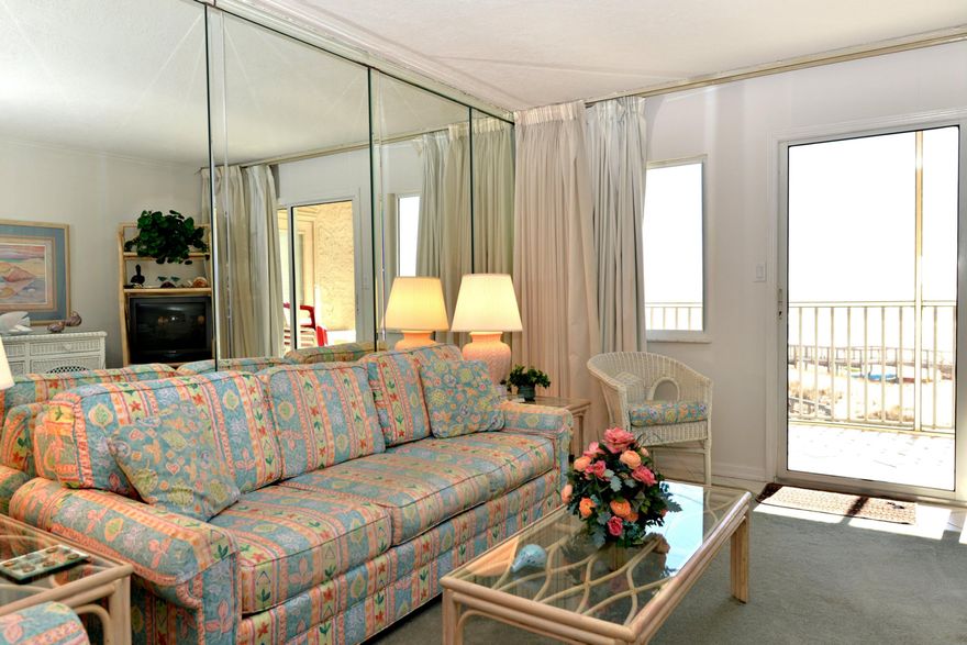 GULF FRONT 2 bedroom, 2 bath immaculate unit with expansive beach and gulf views & a screened balcony gives you privacy without sacrificing views. Facing towards the east, you can stay on the balcony all day with cool afternoon shade. This condo has never been on a rental program & has only been used by the owners. It has been impeccably maintained & is now ready for you to put your stamp on it. The sellers are offering a home warranty with sale at closing for buyer's peace of mind. Holiday Surf & Racquet Club has tennis courts, shuffle board, boardwalk, his & hers exercise rooms, beautiful lobby, lush landscaping throughout the complex, & game room. This complex also offers sauna baths, a large conference room with fully equipped kitchen, & owner's lounge with its kitchen facilities.