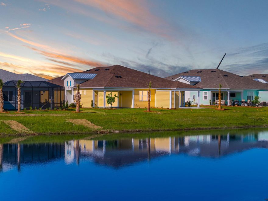 New Construction Never Lived In Tortola Villa!Discover your dream home in the vibrant 55+ community of Latitude Margaritaville Watersound, where luxurious living meets coastal charm, just minutes from the pristine white sands of Panama City Beach. This stunning Tortola Villa features an intelligent layout with two spacious en-suite bedrooms and a versatile den, making it perfect for both relaxation and entertaining. The Master Shower features a Zero Entry floor complimented with a seamless glass enclosure.  Unique to this villa is an additional powder room, providing extra convenience for guests. Built with your safety in mind, the entire home is equipped with HURRICANE WINDOWS, SLIDERS & INSULATED GARAGE DOOR ensuring peace of mind during storm season. Inside, you'll find a harmonious blend of style and functionality with durable laminate and tile flooring, highlighted by exquisite finishes and upgrades. The gourmet kitchen boasts a gas range, soft-close cabinets and drawers, and sleek quartz countertops, all enhanced by elegant 5-14'' baseboards. Step outside to your beautiful paver lanai, where you can unwind while enjoying a serene view of the pond, seamlessly connecting you to the tranquil outdoors. Don't miss your chance to make this exceptional home your own! Enjoy the transferrable 2-10 builders warranty for peace of mind. Latitude Margaritaville is the most sought after 55+ community in the country right now with unmatched amenities including a private restaurant with 3 bars, resort pool, live music daily, pickleball, bocce ball, cornhole, putting green, Fins Up Fitness Center, indoor lap pool & whirlpool and a full lifestyle staff who dedicate their days to ensuring your fun! Phase 2 of the amenities include a full size theatre, Barkaritaville dog spa, woodworking shop, business center and community rooms for clubs, groups, tastings and food demonstrations. The public retail has also begun with the golf cart store in full swing, a bank has just broke ground and anticipating the grocery store, restaurants and other boutique shopping soon as well as Public Marina...all through St Joe! Latitude Margaritaville is the most sought after 55+ community in the country right now with unmatched amenities including a private restaurant with 3 bars, resort pool, live music daily, pickleball, bocce ball, cornhole, putting green, Fins Up Fitness Center, indoor lap pool & whirlpool and a full lifestyle staff who dedicate their days to ensuring your fun! Phase 2 of the amenities include a full size theatre, Barkaritaville dog spa, woodworking shop, pottery room, business center and community rooms for clubs, groups, tastings and food demonstrations.