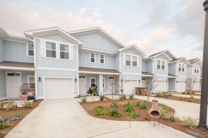Here is a great opportunity to own a nearly new, 1 year old, centrally located, townhome on the beautiful beaches of Panama City Beach! This community DOES allow short term rentals so this could be a primary home, 2nd home, or vacation rental! Along with 3 bedrooms and 2 and a half baths, this home features granite counter tops, stainless steel appliances, upgraded luxury vinyl plank flooring, smart home capability, water filter, and custom paint in the bathrooms and kitchen island. Community boasts a beautiful waterfront pool area and a central location so you can be anywhere on the beach or even over in Panama City in a matter of minutes! This is the only home in this community actively for sale right now, it will go fast so don't wait!