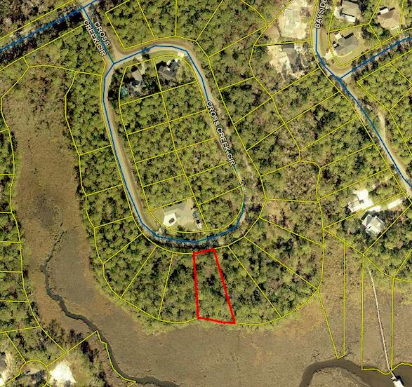 Approximately 0.52 acre wooded lot centrally located in Freeport right off of East Bay Loop (SR-20). This lot would provide beautiful waterfront views from a potential two story home with view of LaGrange Bayou. Cross Creek Shores is a developing subdivision, with homes being built in this neighborhood as recent as 2020.   Buyer to verify all information and dimensions.