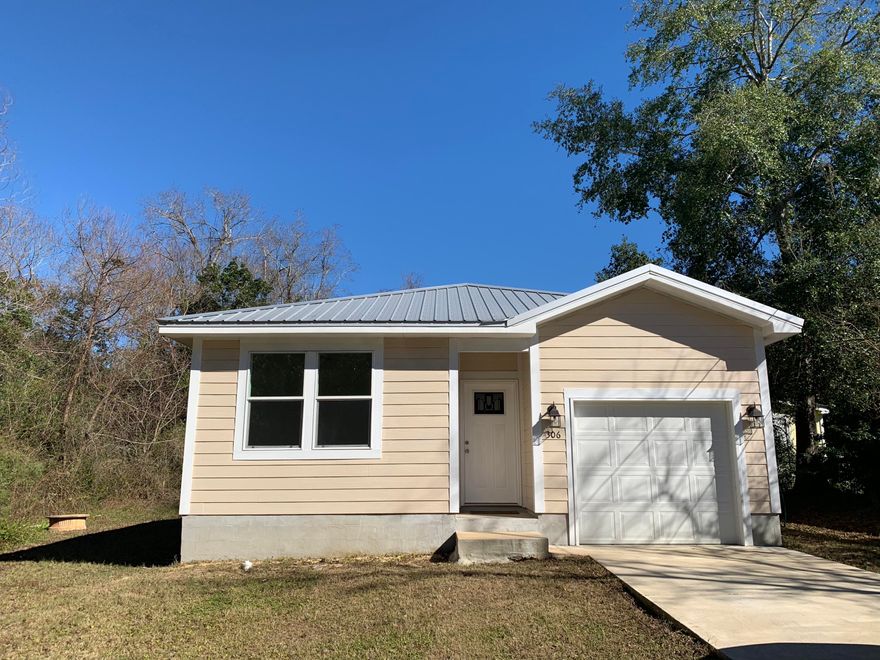 Great Home with metal roof, hardy board siding and single car garage. *All measurements to be verified by Buyer