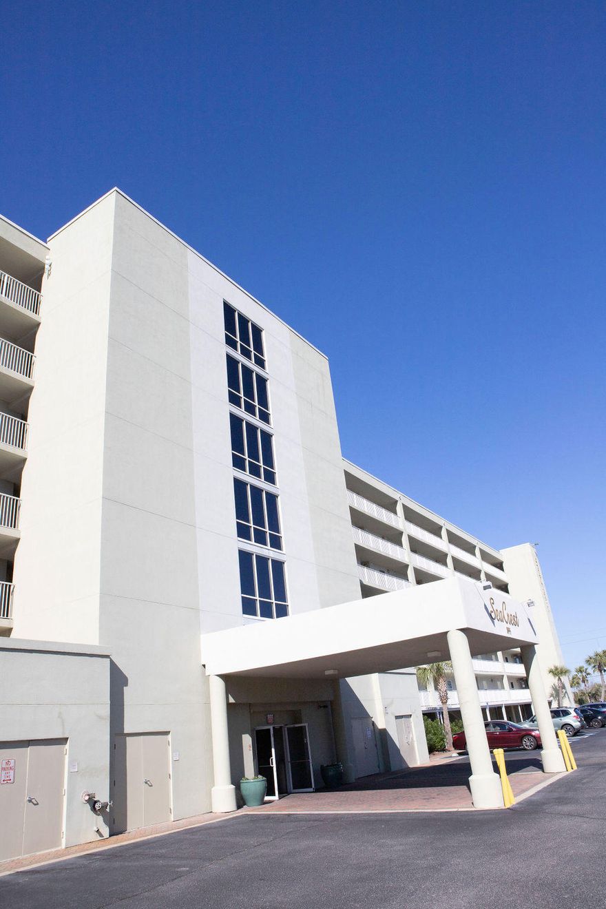 This is a great 6th floor Seacrest condo, PRICED TO SELL, and ready for a new homeowner! Recently updated with freshly painted walls and NEW flooring! One covered parking slot is included. This Seacrest Condo complex has a great beach access, amenities including a work out facility and an indoor/outdoor pool. Conveniently located to shopping, local artisan's, eateries and a short drive to activities in Destin. A MUST SEE in person to appreciate the close proximity to the beautiful Northwest Florida beaches and views! Buyer to verify all data, details and information important to them.