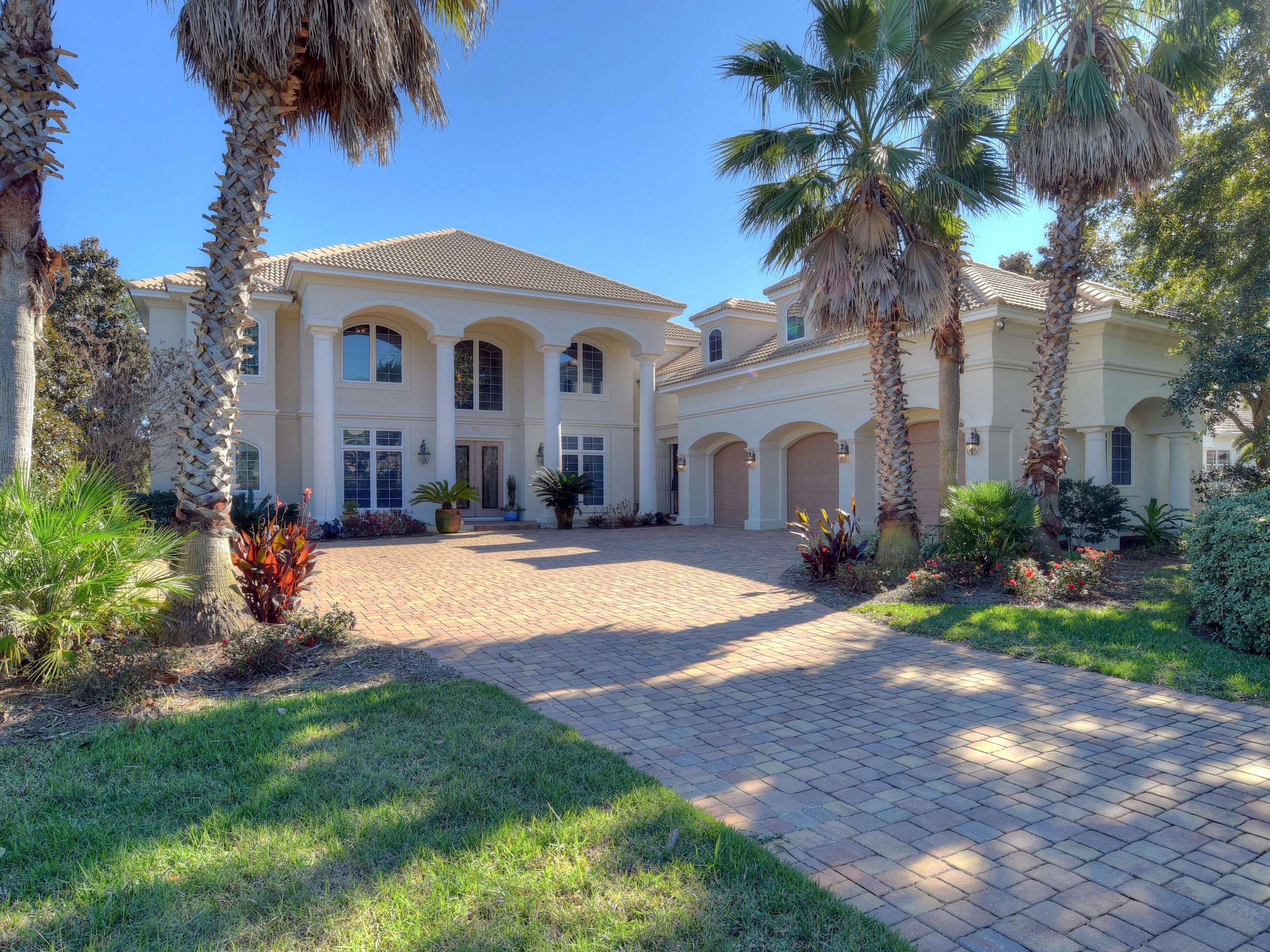 Stunning bayou front custom home in the desirable gate golf course community of Kelly Plantation. Meticulously designed with casual coastal living and entertaining in mind. Great curb appeal with brick paver motor court, impressive entry with columns, double entry doors, two story foyer. Formal dining room is just off the foyer. The living room offers abundant natural light with a two story wall of glass overlooking the pool and bayou. Open concept kitchen/casual dining and family room also overlooking the water. Seller's have just completed a kitchen renovation, now features new cabinetry, stainless appliances including new Jenn-Aire glass cooktop, refrigerator, microwave and dishwasher. The master suite is on the first level, as is an additional bedroom and full bath, office,