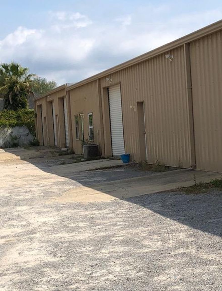 4228 SF Industrial Free Standing Building, located in the heart of Destin, conveniently located right off of Hwy 98, 4 ground level rollup doors, possibility to subdivide.