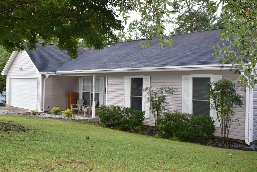 **PRICE REDUCTION*****Seller offing a $4,000 repair allowance with an executed offer***Located south of interstate 10. This contemporary designed home has a spacious split bedroom design. Great room with fireplace and raised ceilings. French doors open to a sizable room that can be used as an office or 4th bedroom. Separate Dining room or sitting room. Fully equipped kitchen with gas oven/stove, microwave/hood, side-by-side refrigerator w/ water & ice in door, dishwasher, pantry, lots of cabinets and counter space with an island. Eat in Kitchen with bay windows with a view of the over sized wooded backyard. Inside laundry room off the kitchen. New drain field in 2002. New roof in 2004.