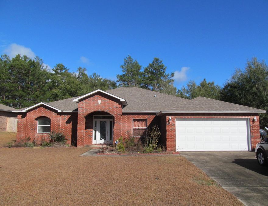 Just reduced! Looking for a deal? then look no more!! This brick 4 bedroom/ 3 bath is located in one of Defuniak Springs nicest subdivisions. One way in one way out gives the subdivision a gated community feel. Lake privileges for all homeowners.The open floor plan makes this home spacious and airy. The custom island kitchen is designed for entertaining. Living room and family room with fireplace lead to the dining area and kitchen. the master bedroom has his & hers closets and vanities. Two car attached garage. Privacy fence. Shown by appointment. Property is being sold ''As Is'' with right to inspect. Seller will do no repairs
