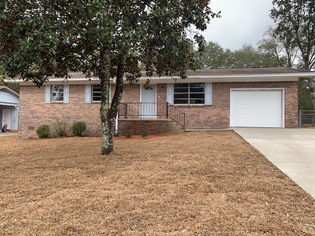 **Available November 1!!**This beautifully renovated 3-bedroom, 2-bathroom home combines classic charm with modern touches, offering an ideal living space for comfort and style. The exterior features a well-maintained brick facade, mature trees, and a one-car garage.Inside, you'll be greeted by a bright, open living space with large windows and updated flooring throughout. The kitchen boasts elegant white cabinetry, granite countertops, stainless steel appliances, and plenty of counter space--perfect for those who love to cook and entertain.The primary bedroom offers ample space, while the additional bedrooms are perfect for family or guests. Both bathrooms have been tastefully updated, with the primary bath featuring a stylish shower.