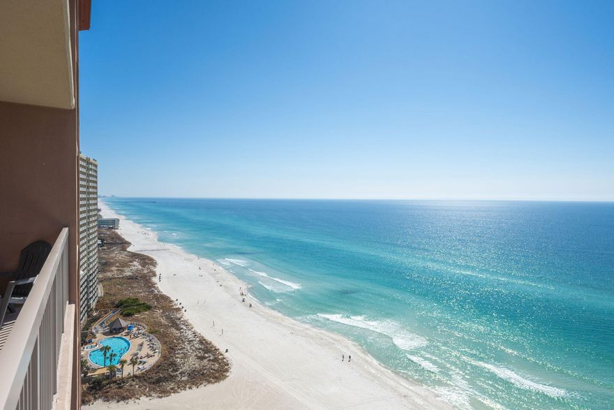 OPEN HOUSE -Sunday 1-4pm Call Kim at 970-290-2944 for entry! Experience Coastal living at its Best! This stunning waterfront condo on the 20th floor offers breathtaking panoramic views of the Gulf of Mexico from both the living room and master bedroom. Imagine starting each day with a cup of coffee on your private balcony, soaking in the emerald waters, while seagulls and playful dolphins dance in the waves. The Sunrise Beach Resort is ideally located just 1.4 miles from Pier Park, a premier shopping and entertainment hub, offering everything from great food to fantastic shopping, all nestled by one of the most beautiful beaches in the country.Sunrise Beach Resort boasts exceptional amenities including two pools (with the east pool heated), two spas, and a spacious lounging area. Enjoy the Owners Lounge, pool and ping pong tables, and a fully equipped fitness center overlooking both the pool and the Gulf.

As you enter this unit, you're immediately greeted by sweeping views of the Gulf through 8-foot sliding doors, leading to a large balcony that stretches the entire length of the unit. The condo has been recently repainted, with tile flooring throughout and laminate in the master bedroom and bonus room. The kitchen features sleek granite countertops, stainless steel appliances, a breakfast bar, and a cozy dinette for extra seating. The master bath includes a double vanity, a garden tub, and a separate shower. The bonus room with bunk beds is perfect for guests, and there's a full bath across the hall with a tub/shower combo. The unit also includes a convenient washer and dryer combo for added ease. Don't miss out on this great opportunity to own a piece of Paradise!