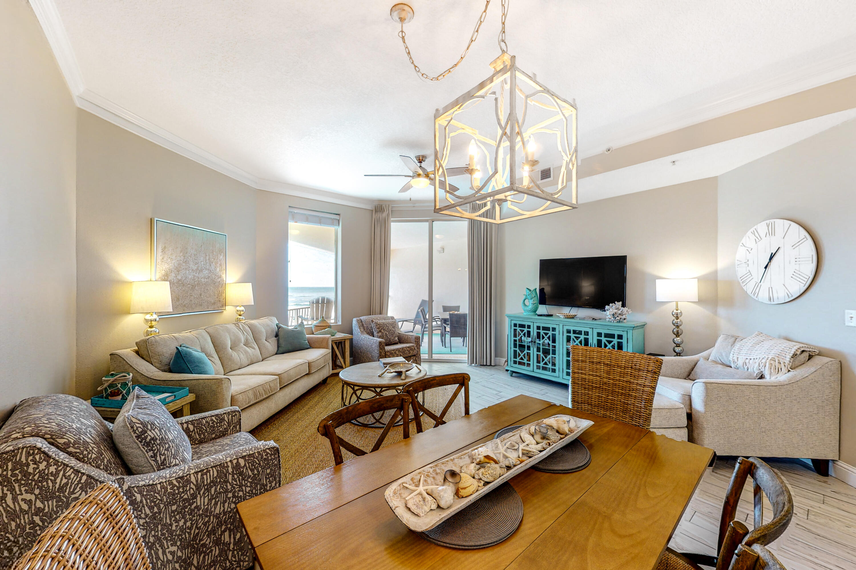 Situated on the top floor at the popular Dunes of Seagrove, this unit enjoys gorgeous pool and Gulf views. The floor-to-ceiling sliding glass doors in the living area and master bedroom frame the picturesque Gulf view just beyond the spacious balcony, perfect for soaking in the views of the emerald green waters of the Gulf of Mexico. Light colors and high ceilings accentuate the spaciousness of its open floor plan as do the updates throughout the unit. The stylish kitchen features modern shaker style cabinets, quartz countertops, tile backsplash, and stainless steel appliances. The spacious floor plan includes an additional guest room, bunk room, and guest bathroom. The master bedroom suite is elegantly decorated and features an accented shiplap wall, a lavish sitting area, balcony access and an ensuite bath complete with a tiled walk-in shower, soaking tub and double vanities.
Additional upgrades to this well appointed condo include custom light fixtures, crown molding in the kitchen and living room, new cabinets in both bathrooms and extended kitchen countertops. Dunes of Seagrove is one of few condo complexes on 30A that offers top notch amenities including direct beach access via a private boardwalk with no steep steps, two large resort style pools that are seasonally heated, a hot tub, an exercise room, a sauna and steam room, on-site bike rentals, a grilling area, tennis courts, beachside kayak and paddle board rentals and an on-site rental management company. This unit is being offered furnished and turnkey ready and would make a great second home, or a perfect investment property.