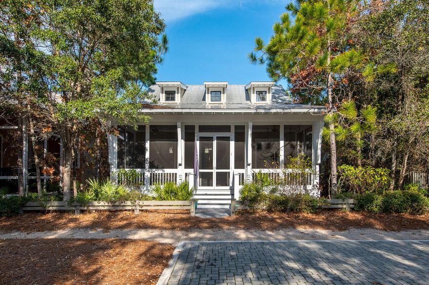 CHARMING WATERCOLOR cottage with all the classic features throughout home. PRIME LOCATION one block from Camp Watercolor and a short walk to the Watercolor Town Center, Tennis/Pickle Ball Courts and the recently expanded Beach Club, You will love the open floor plan with soaring ceilings, classic heart pine floors, shiplap siding walls and other cottage trim details. The chef's kitchen has granite counter tops and stainless appliances including a gas range. The screened porch spans the front of the home and looks across Western Lake Drive to one of Watercolor's many pocket parks. The home is being offered furnished with minor exclusions. Buyers should verify all dimensions.